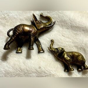Set of vintage bronze elephant statues